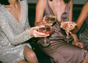 ladies sitting with alcohol drinks